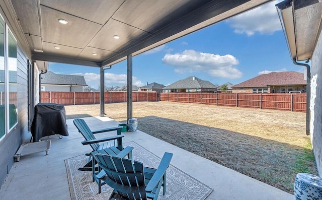 view of patio / terrace with a grill and a fenced backyard