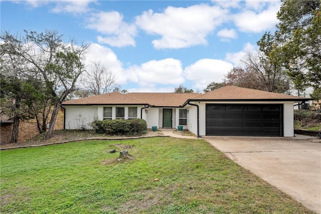 ranch-style home featuring a front yard and a garage