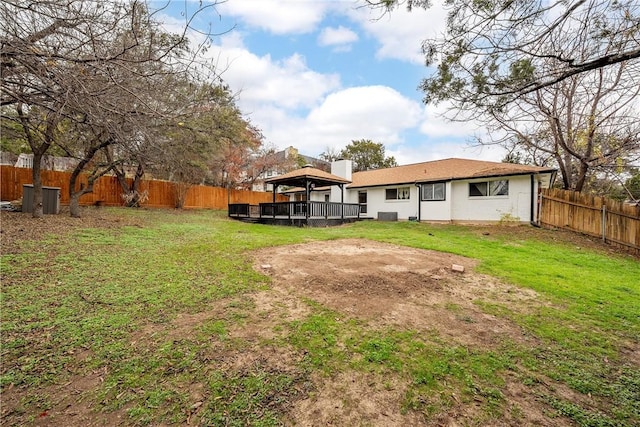 view of yard featuring a gazebo and a deck