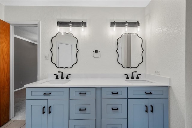 bathroom featuring tile patterned floors and vanity