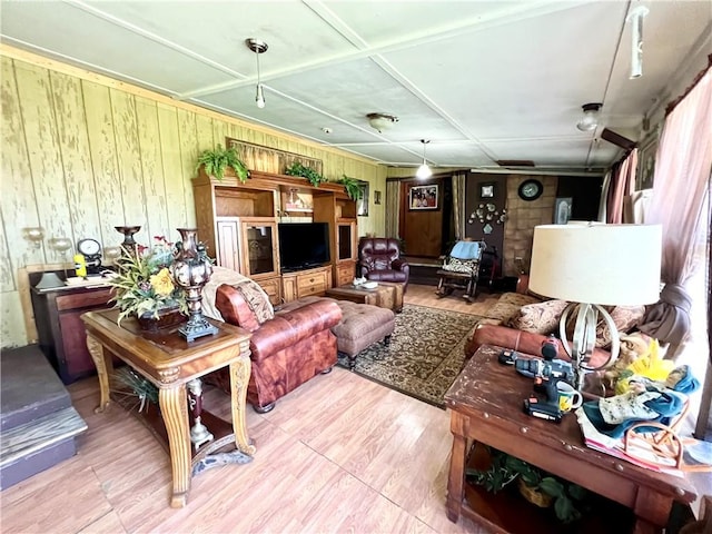 living room featuring wooden walls