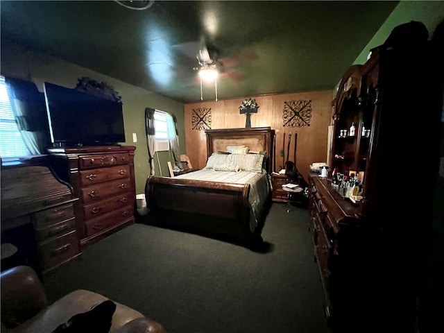 bedroom with ceiling fan and carpet