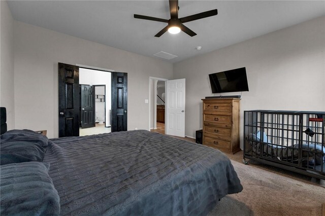 carpeted bedroom with ceiling fan