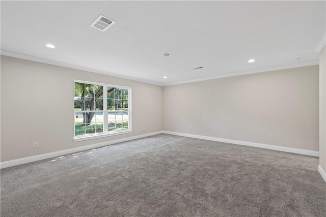 carpeted spare room with ornamental molding