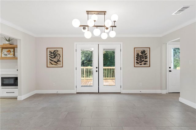 interior space featuring crown molding, french doors, light tile patterned floors, and a notable chandelier