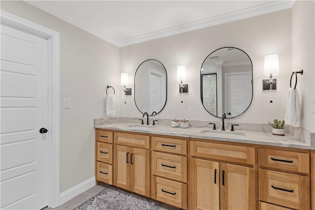 bathroom featuring tile patterned floors, vanity, and crown molding