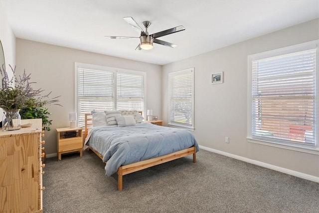 bedroom with a ceiling fan, carpet, and baseboards