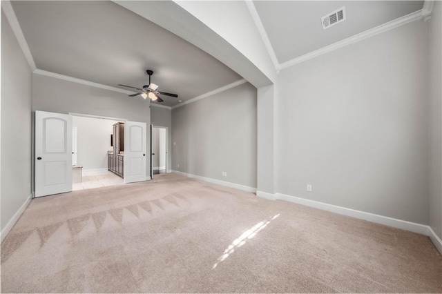 interior space with crown molding, ceiling fan, and vaulted ceiling