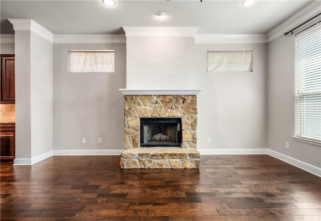 unfurnished living room with a fireplace, crown molding, and dark wood-type flooring