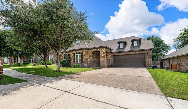 french country home featuring a front lawn