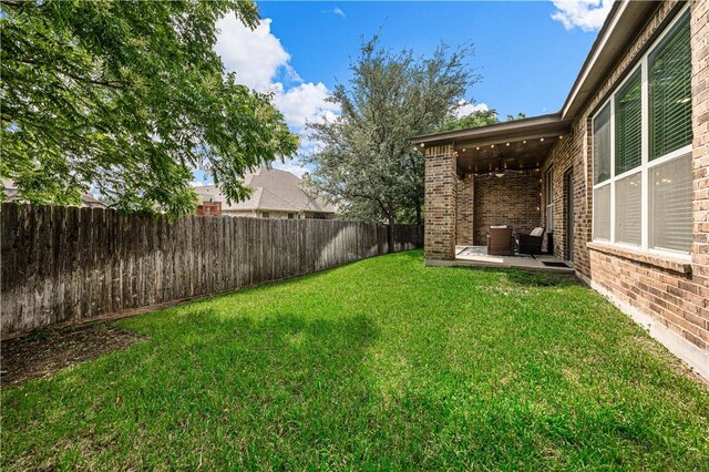 view of yard with a patio area