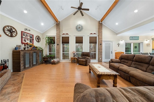 living room featuring beamed ceiling, high vaulted ceiling, light hardwood / wood-style flooring, and ceiling fan