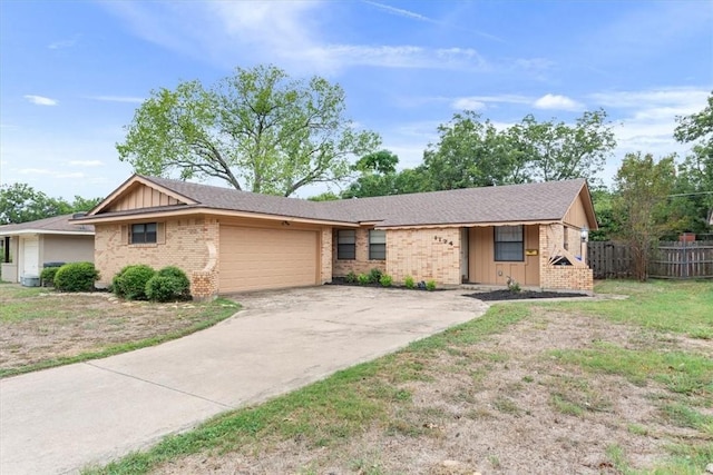 single story home featuring a garage