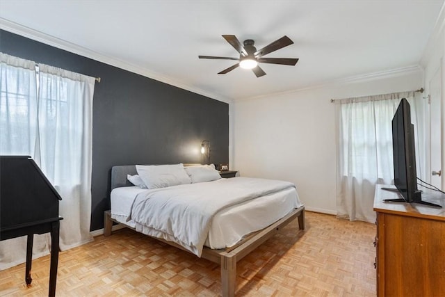 bedroom with light parquet flooring, multiple windows, crown molding, and ceiling fan