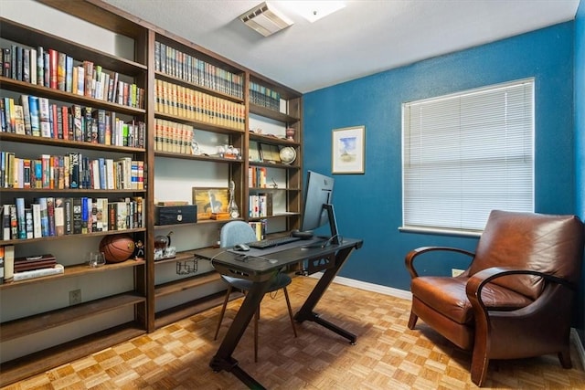 office with light parquet flooring