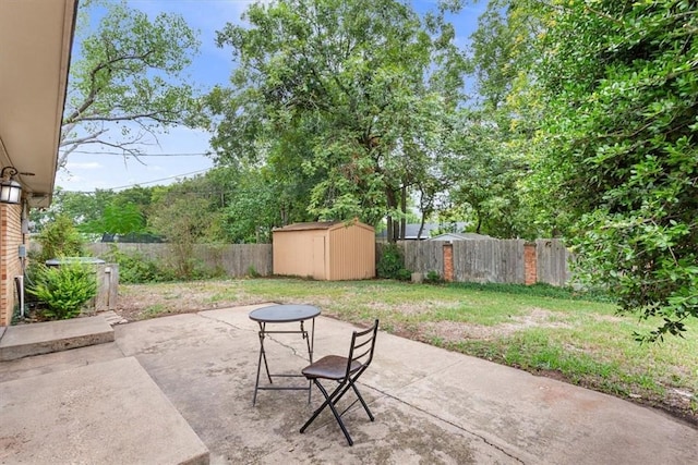 view of patio featuring a storage unit