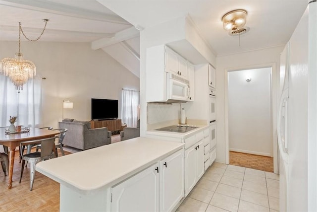 kitchen featuring white appliances, white cabinets, vaulted ceiling with beams, decorative light fixtures, and kitchen peninsula