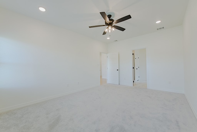 carpeted empty room with ceiling fan