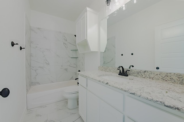 full bathroom featuring vanity, toilet, and tiled shower / bath