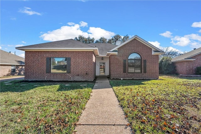 view of front of property with a front lawn