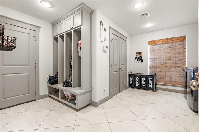 mudroom with washer / dryer