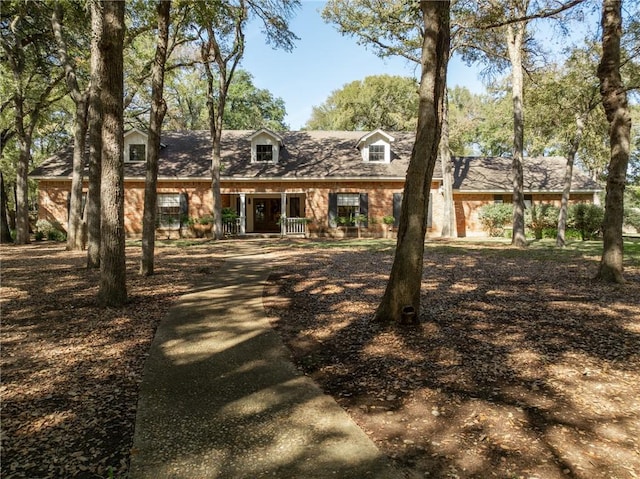 view of new england style home