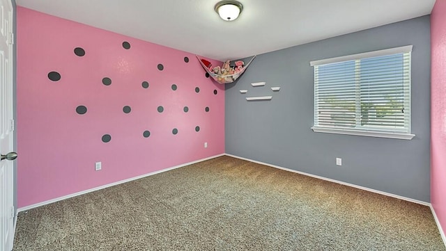 unfurnished bedroom with carpet flooring