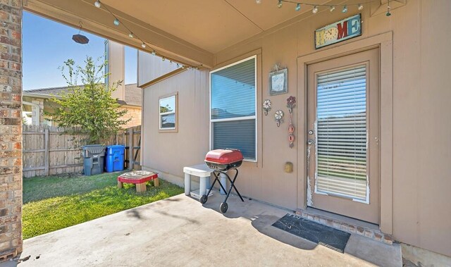 doorway to property with a patio area