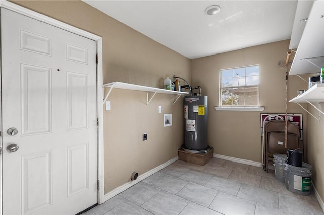 laundry area featuring light tile patterned floors, electric water heater, and electric dryer hookup