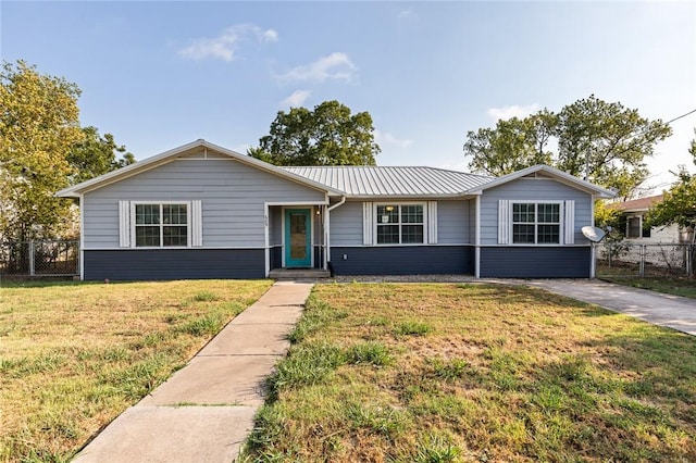 ranch-style home featuring a front yard