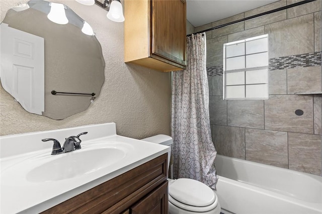 full bathroom featuring vanity, toilet, and shower / tub combo with curtain