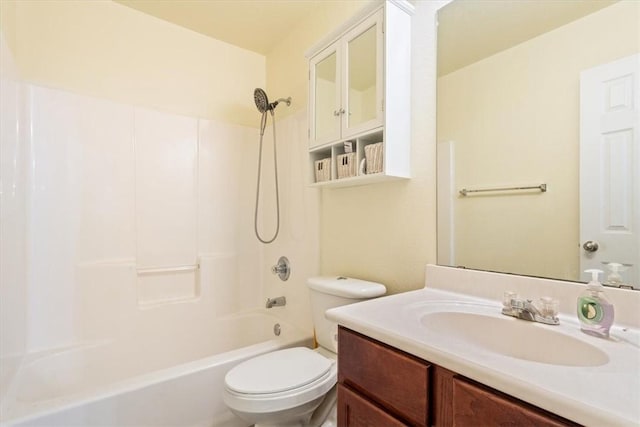 full bathroom featuring shower / bathtub combination, vanity, and toilet