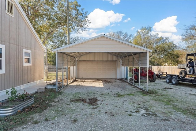 garage featuring a carport