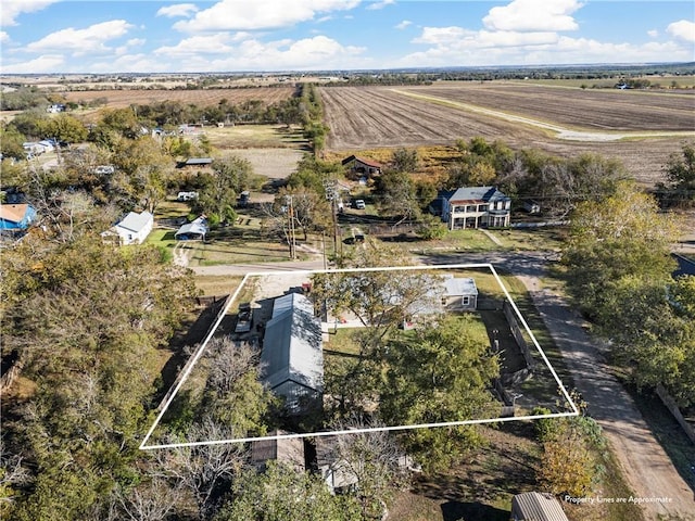 birds eye view of property featuring a rural view