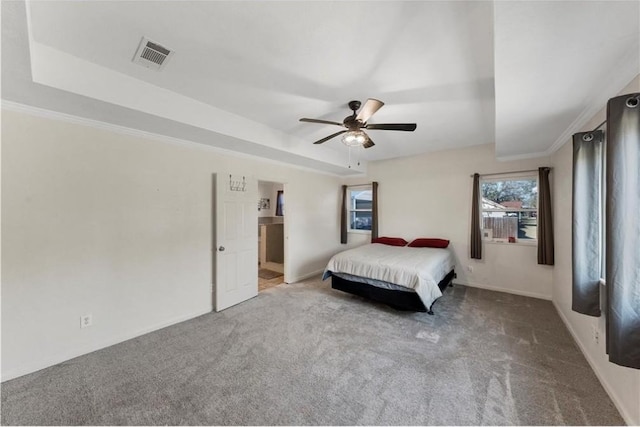 unfurnished bedroom featuring carpet, ceiling fan, and crown molding