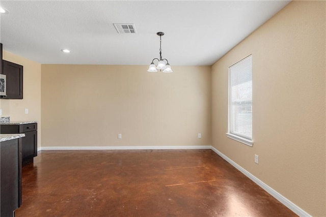 unfurnished dining area featuring visible vents, baseboards, a chandelier, finished concrete floors, and recessed lighting