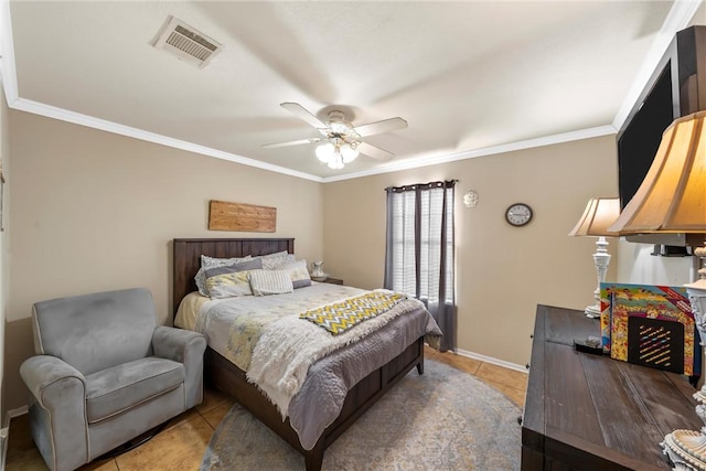 tiled bedroom with ceiling fan and ornamental molding