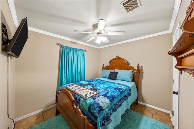 tiled bedroom featuring ceiling fan and ornamental molding