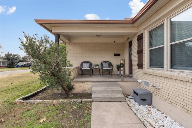 view of patio featuring a porch