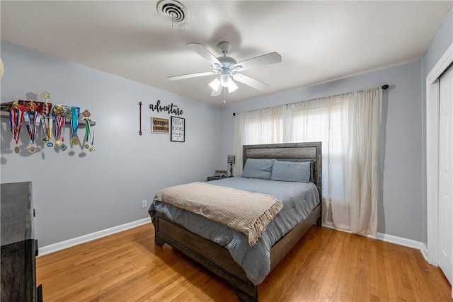 bedroom featuring ceiling fan and hardwood / wood-style flooring