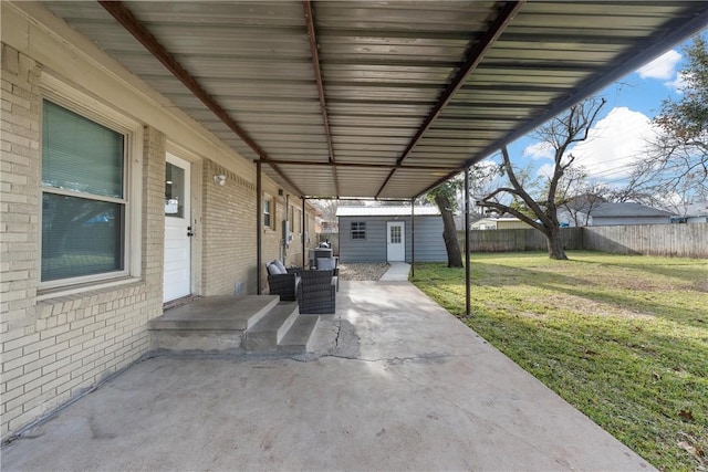 view of patio featuring an outdoor structure