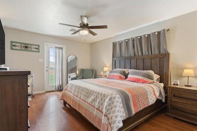 bedroom with visible vents, a ceiling fan, access to outside, wood finished floors, and baseboards