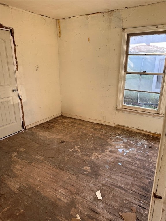 empty room featuring dark hardwood / wood-style floors