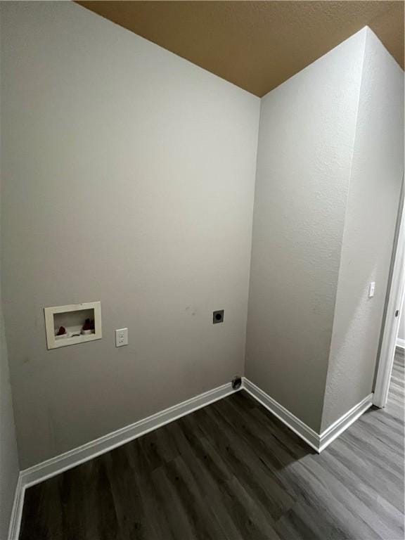 laundry area with hookup for an electric dryer, washer hookup, and dark wood-type flooring