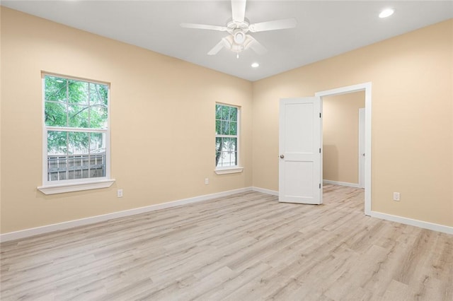 unfurnished room featuring ceiling fan and light hardwood / wood-style flooring