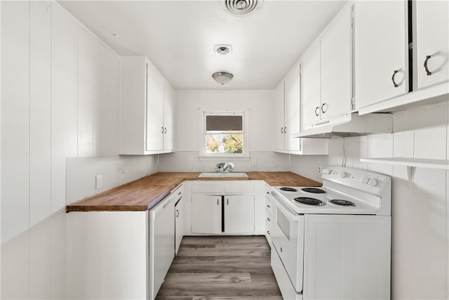 kitchen featuring white appliances, dark hardwood / wood-style floors, white cabinetry, and sink