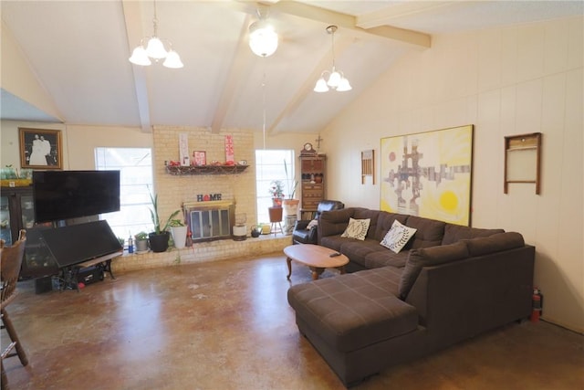 living area with a fireplace, plenty of natural light, lofted ceiling with beams, and finished concrete flooring