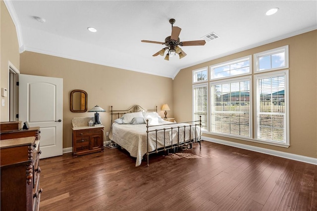 bedroom with lofted ceiling, dark wood-type flooring, ceiling fan, and crown molding