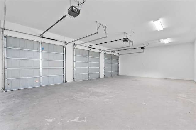 garage featuring a garage door opener