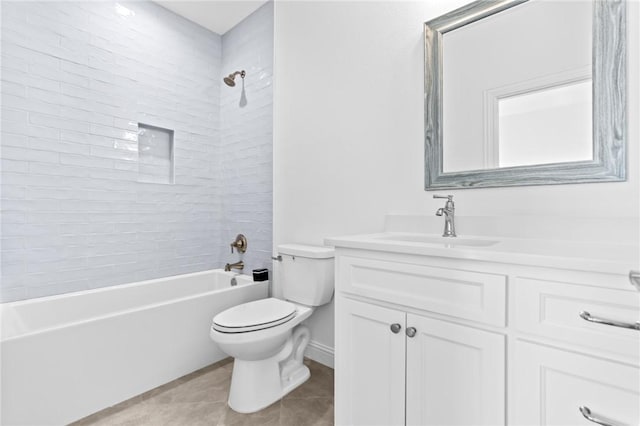 full bathroom featuring tile patterned floors, tiled shower / bath combo, toilet, and vanity